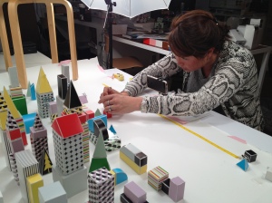 Grace arranges Paper Punk pieces for her stop-motion Kickstarter promo.